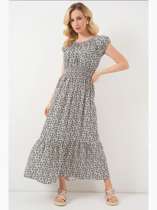 Bloemen a-lijn maxi-jurk met elastische details bdart - Kiabi Bloemen a-lijn maxi-jurk met elastische details bdart - Kiabi