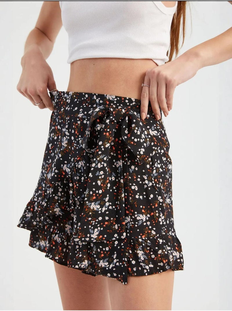 Bloemenbroekje met hoge taille en riemdetail hiccup Zwart - Kiabi