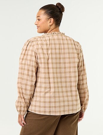 Blouse à carreaux avec encolure nouée