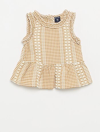 Blouse à volants aux emmanchures