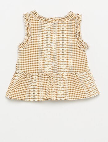 Blouse à volants aux emmanchures