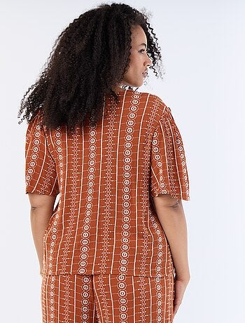 Blouse avec nœuds et broderies à manches courtes
