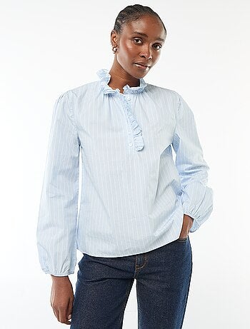 Blouse avec volants au col et à l'ouverture