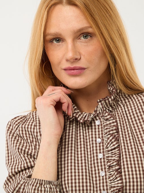 Blouse avec volants au col et à l'ouverture - Kiabi Blouse avec volants au col et à l'ouverture - Kiabi