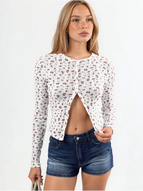 Blouse courte côtelée à fleurs avec fermeture boutonnée busem - Kiabi Blouse courte côtelée à fleurs avec fermeture boutonnée busem - Kiabi