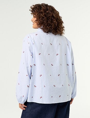 Blouse fleurs brodées avec col montant
