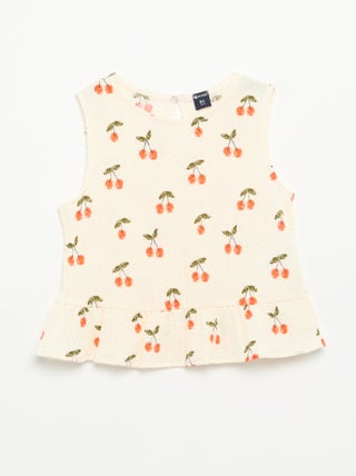 Blouse gaufrée sans manches