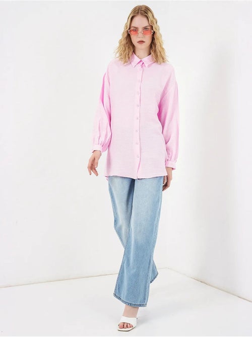 Blouse longue oversize texturée avec col chemise bdart - Kiabi Blouse longue oversize texturée avec col chemise bdart - Kiabi