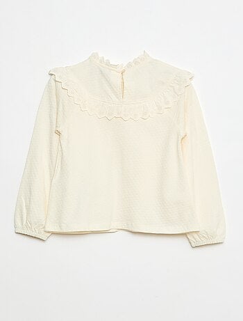 Blouse manches longues col rond avec plastron volanté avec broderies