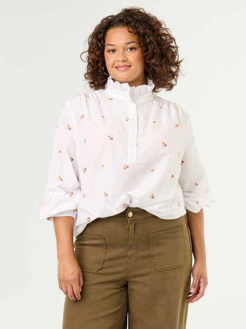 Blouse met geborduurde bloemen en opstaande kraag - Kiabi Blouse met geborduurde bloemen en opstaande kraag - Kiabi