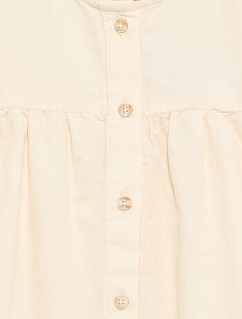 Blouse met geborduurde manchetten en een geplooide kraag