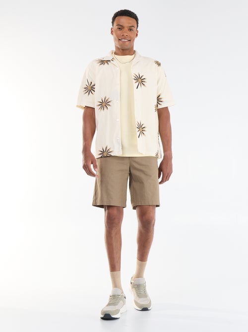 Blouse met korte mouwen en geborduurd motief - Kiabi Blouse met korte mouwen en geborduurd motief - Kiabi