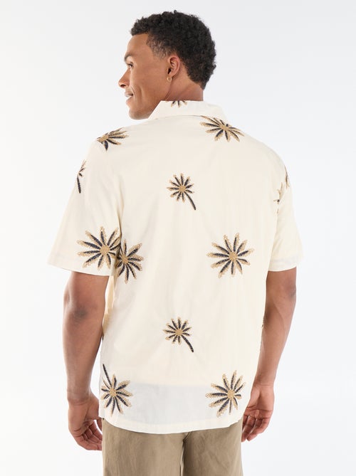 Blouse met korte mouwen en geborduurd motief - Kiabi Blouse met korte mouwen en geborduurd motief - Kiabi