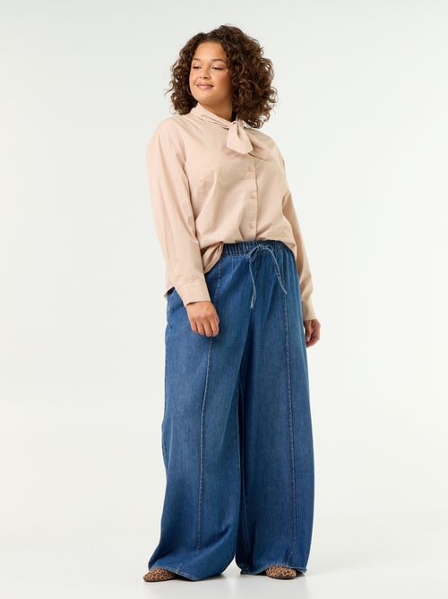 Blouse met lange mouwen en lavallièrekraag - Kiabi Blouse met lange mouwen en lavallièrekraag - Kiabi