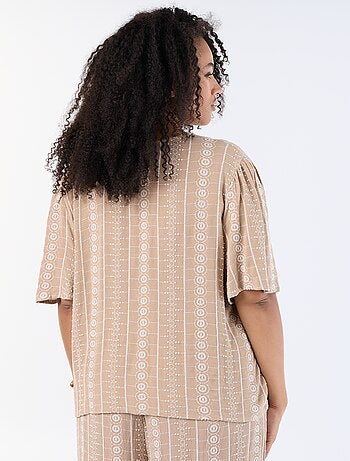 Blouse met strikjes en borduursels met korte mouwen
