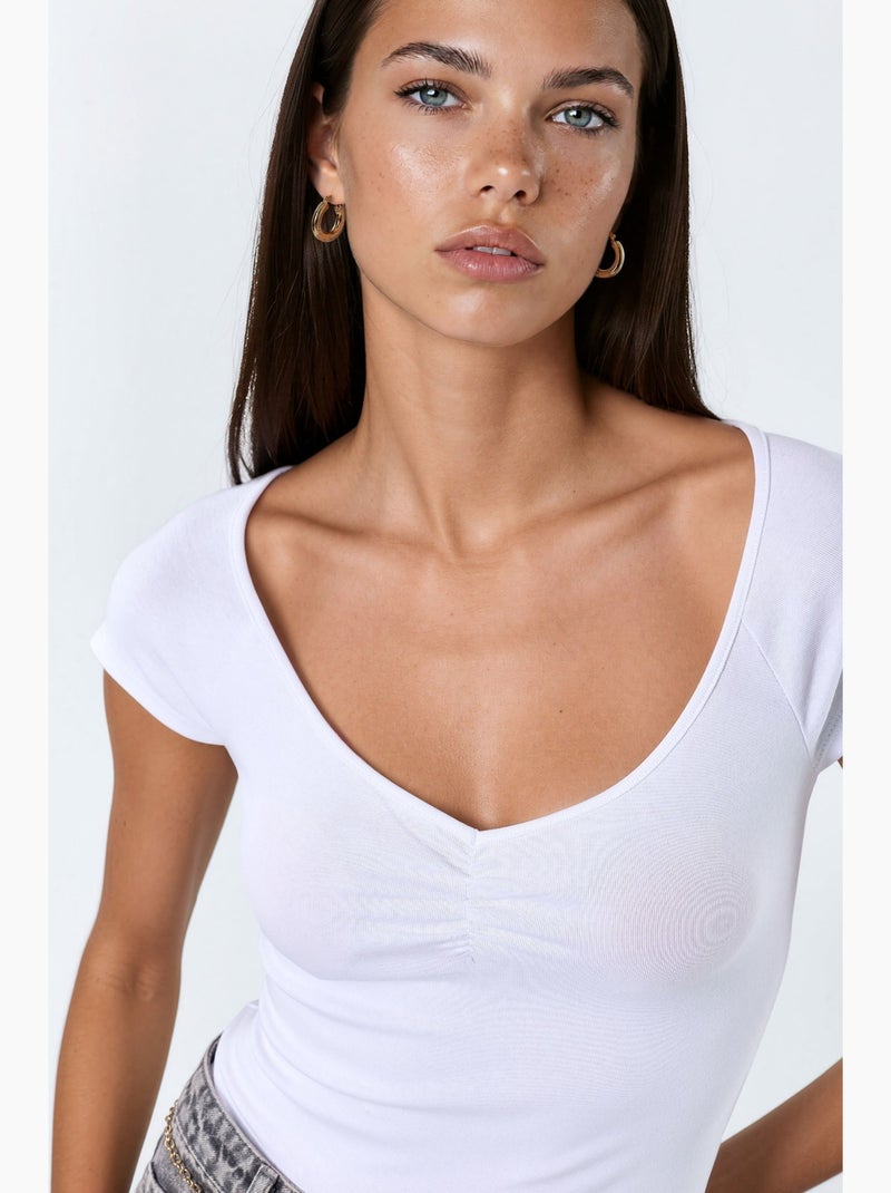Blouse met v-hals en korte mouwen met drapering busem Wit - Kiabi