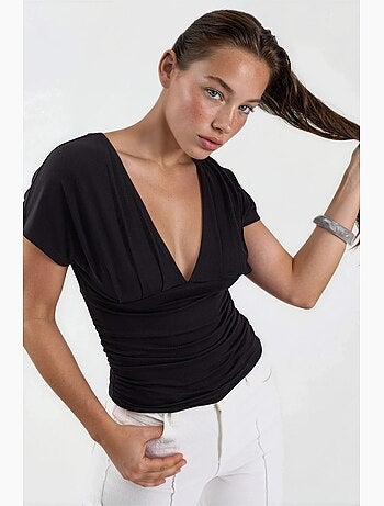 Blouse met v-hals en strikdetail busem