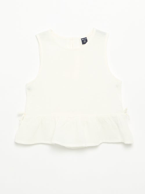 Blouse peplum  avec nœuds fantaisies - Kiabi