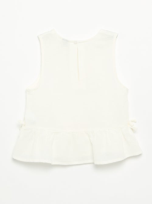 Blouse peplum  avec nœuds fantaisies - Kiabi