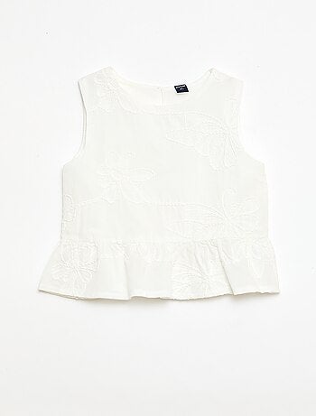 Blouse sans manches avec broderies fleuries