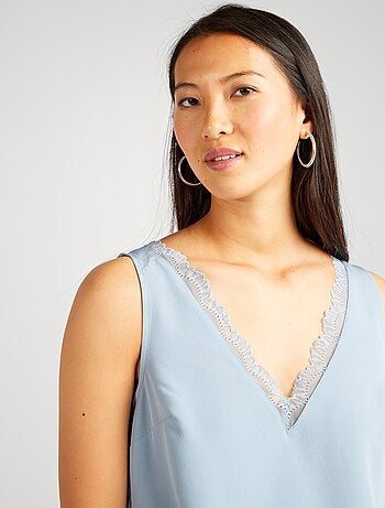 Blouse sans manches avec col en dentelle