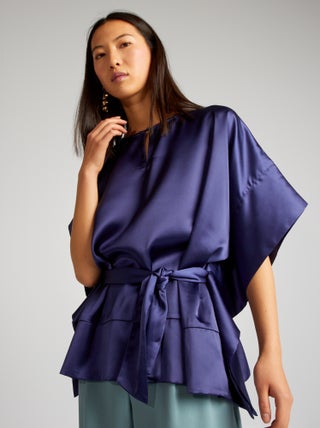 Blouse sans manches unie et satinée