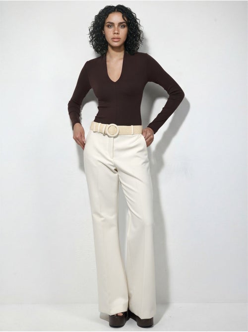 Blouse slim à manches longues avec col en v busem - Kiabi Blouse slim à manches longues avec col en v busem - Kiabi