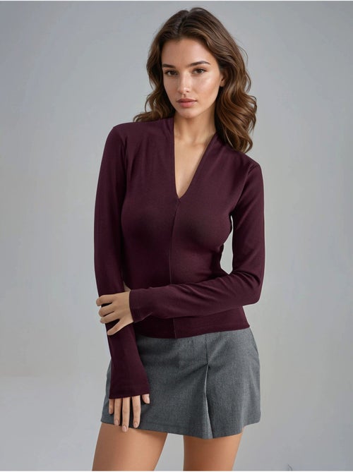 Blouse slim à manches longues avec col en v busem - Kiabi Blouse slim à manches longues avec col en v busem - Kiabi