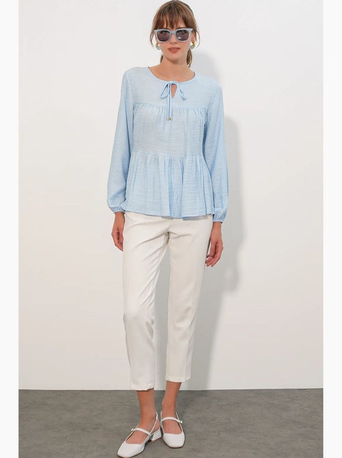 Blouse structuur met knoop voor bdart - Kiabi Blouse structuur met knoop voor bdart - Kiabi