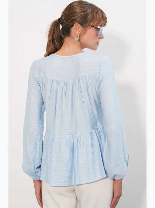 Blouse structuur met knoop voor bdart - Kiabi Blouse structuur met knoop voor bdart - Kiabi