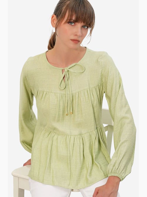 Blouse structuur met knoop voor bdart - Kiabi Blouse structuur met knoop voor bdart - Kiabi