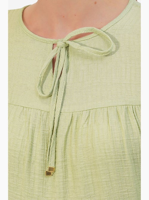 Blouse structuur met knoop voor bdart - Kiabi Blouse structuur met knoop voor bdart - Kiabi