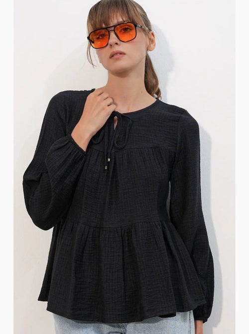 Blouse structuur met knoop voor bdart - Kiabi Blouse structuur met knoop voor bdart - Kiabi