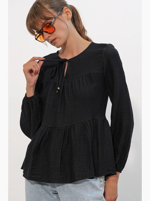 Blouse structuur met knoop voor bdart - Kiabi Blouse structuur met knoop voor bdart - Kiabi