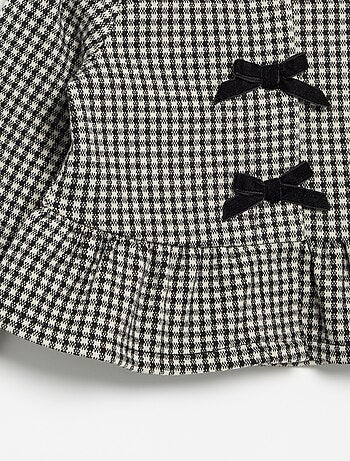 Blouse van flanel met strikjes en een ruche aan de onderkant
