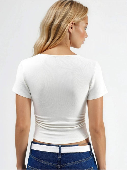 Blouse van stretchbreisel met gedrapeerd detail en aansluitende pasvorm hiccup - Kiabi