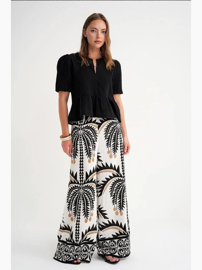 Blouse van structuurmousseline met ronde hals en knopen mixray Zwart - Kiabi