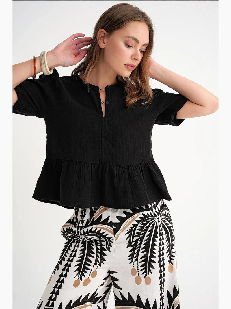 Blouse van structuurmousseline met ronde hals en knopen mixray Zwart - Kiabi