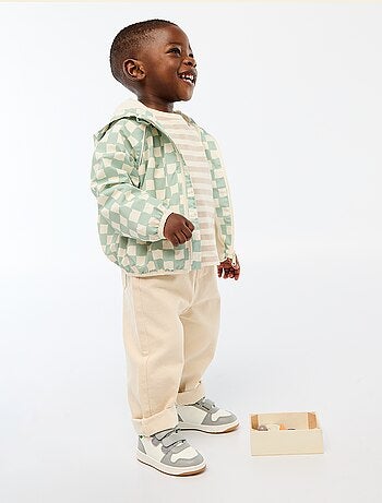 Blouson coupe vent à capuche all-over