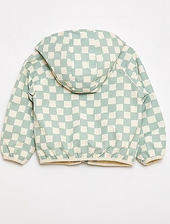 Blouson coupe vent à capuche all-over