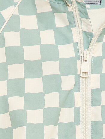 Blouson coupe vent à capuche all-over