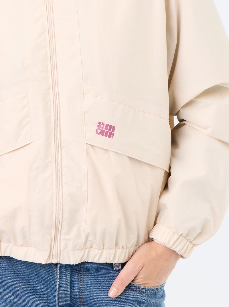 Blouson coupe-vent à capuche Beige - Kiabi