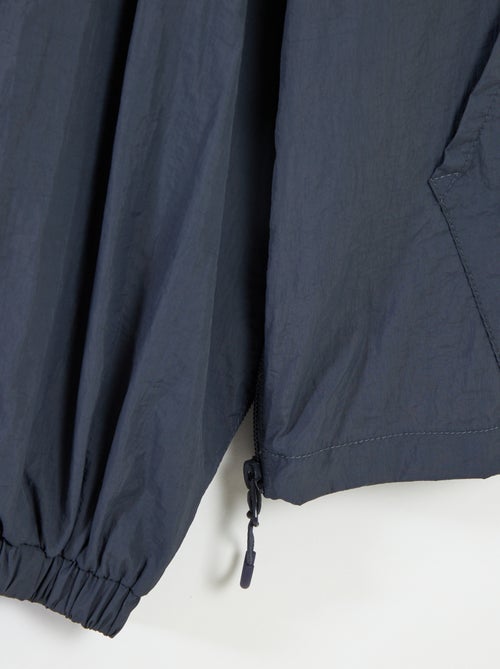 Blouson de pluie à capuche - collection facile à enfiler - Kiabi