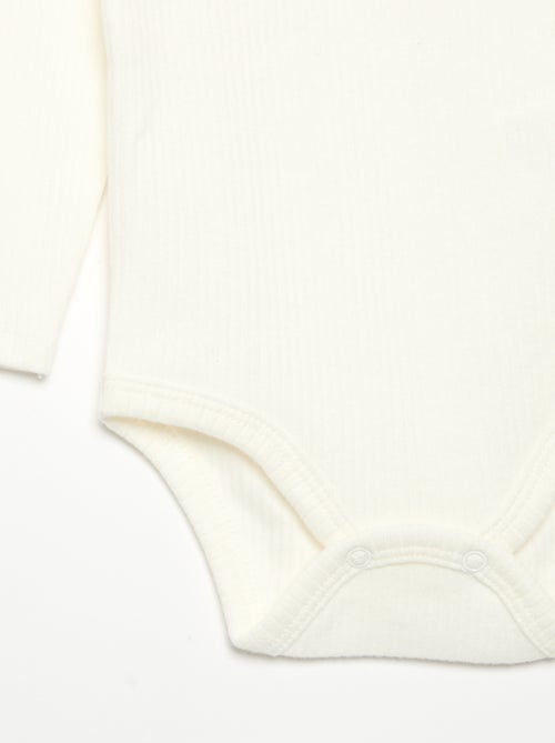 Body van ribstof met fantasiekraag - Kiabi Body van ribstof met fantasiekraag - Kiabi