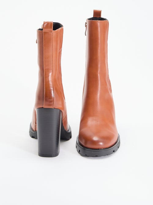 Boots en simili à talon haut - Kiabi Boots en simili à talon haut - Kiabi