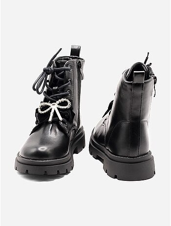 Bottines avec un nœud décoratif
