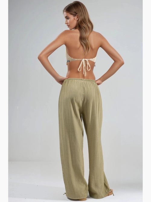 Broek met elastische taille en strikdetail busem - Kiabi Broek met elastische taille en strikdetail busem - Kiabi