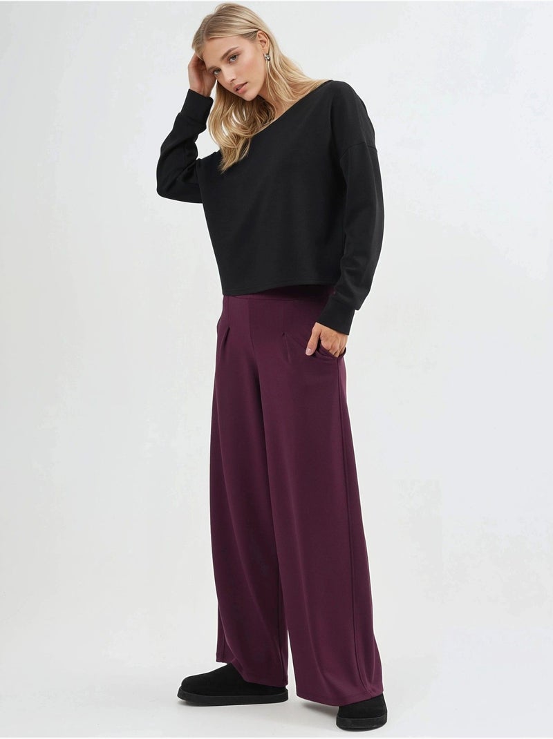 Broek met elastische taille en wijde pijpen busem Bordeauxrood - Kiabi