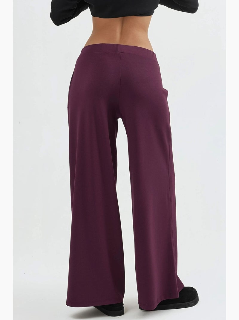 Broek met elastische taille en wijde pijpen busem Bordeauxrood - Kiabi