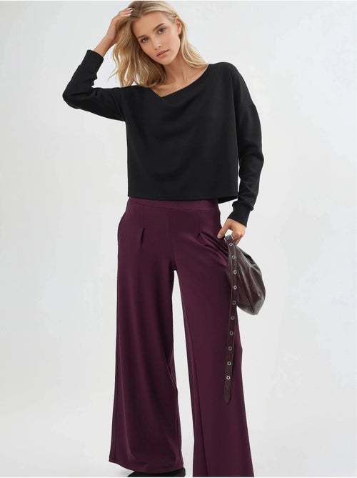 Broek met elastische taille en wijde pijpen busem - Kiabi Broek met elastische taille en wijde pijpen busem - Kiabi